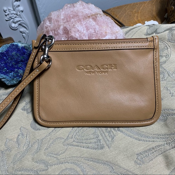 Coach Handbags - NWOT Coach Tan Leather Wristlet w/ Embossed Logo